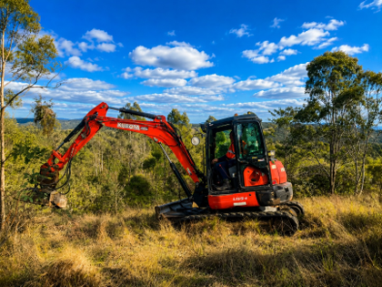 Bushcare excavator with flail in operation at Mt Granchester.